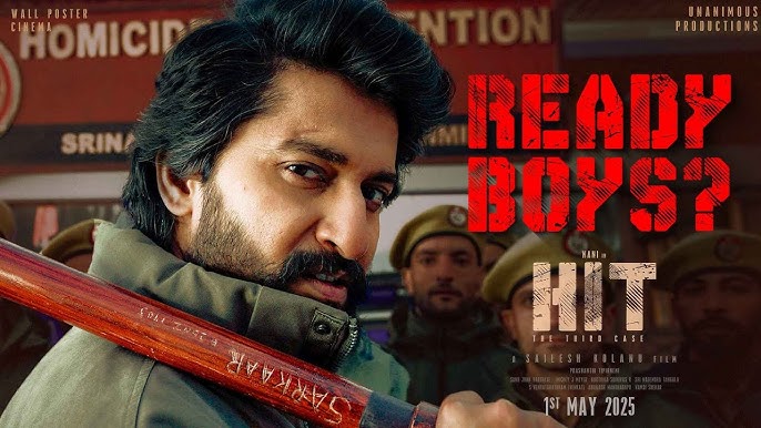 A close-up of a man with intense eyes and a mustache, gripping a baseball bat labeled "SARIPODHA SANIVARAM." Behind him, uniformed officers stand in the background, with bold red text reading "READY BOYS?" and the title "HIT: The Third Case